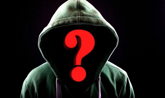 Picture of hooded person with a question mark where their face would be.