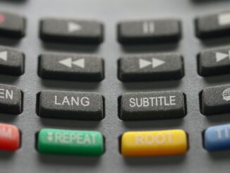 Keyboard with key for subtitles