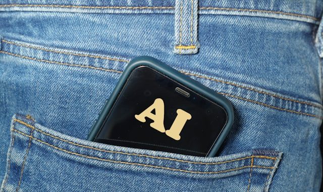 Photo of phone with AI on screen in pocket of jeans